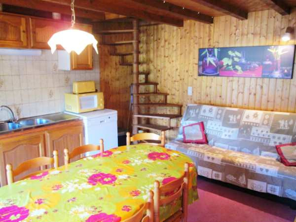 Séjour avec canapé, salle à manger/Living room with a sofa, dining room-Chalet Pollet-Le Grand-Bornand