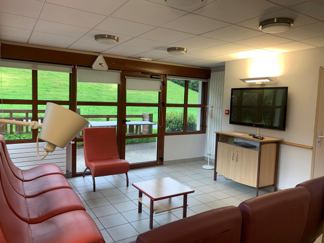 Salon chalet collectif hermitage village le grand bornand